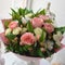 Beautiful gentle bouquet of roses on a table