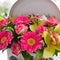 Beautiful gently bouquet in a hat box at a window