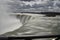 Beautiful gigantic frozen Horseshoe Niagara Waterfalls on a frozen spring day in Niagara Falls in Ontario, Canada