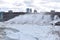 Beautiful gigantic frozen Niagara Waterfalls on a frozen spring day in Niagara Falls in Ontario, Canada