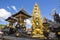 Beautiful gilded chapel with a statue at a Hindu house of Nusa Penida-Bali, Indonesia