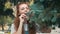 Beautiful ginger woman on diet eating pine needles