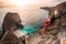 Beautiful girl on the background of Kelingking beach, Nusa Penida Indonesia. A young woman is traveling in Indonesia. Nusa Penida