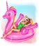 a beautiful girl in a bikini lies on an inflatable unicorn
