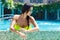 beautiful girl in bikini at the pool in the hotel. Summer v