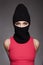 Beautiful girl in black balaclava. Trendy Mask on pretty woman