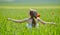 Beautiful girl on blooming poppy field