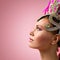 Beautiful Girl in carnival headdress on pink background.