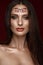 Beautiful girl with creative arab makeup, straight long hair and perfect skin, . Beauty face.