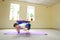 Beautiful girl doing stretching exercises and yoga asanas.