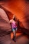 Beautiful girl exploring Lower Antilope Canyon in Arizona