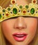 Beautiful girl with fair hair in the crown of a princess with diamonds sapphires and rubies