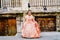 Beautiful girl fallera wearing the traditional Valencian costume of Fallas, during a beauty session and posing outdoors