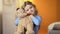 Beautiful girl with favourite teddy bear toy smiling at camera, happy childhood