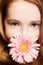 Beautiful girl with gerbera