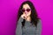Beautiful girl glamour portrait on magenta in heart shape sunglasses, long curly hair