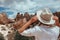 beautiful girl in a hat looks at the landscape of cappadocia