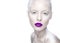 Beautiful girl in the image of albino with purple lips and white eyes. Art beauty face.