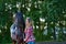 Beautiful girl with long hair on a walk with a horse.