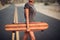 Beautiful girl with long legs enjoys a ride on a longboard at summertime. Outdoors sports activities.