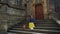 Beautiful girl in a long yellow skirt with a backpack sits on the steps near the Catholic Church, general plan