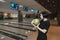A beautiful girl looks at the skit and is about to make a bowling balloon shot. Bowling game