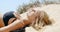 Beautiful Girl Lying on Sandy Dune