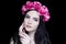 Beautiful girl, massive accessory flowers crown