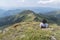 Beautiful girl in the mountains. An incredible view of the Troyan Balkan. The mountain captivates with its beauty, fresh air, a