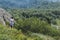 Beautiful girl in the mountains. An incredible view of the Troyan Balkan. The mountain captivates with its beauty, fresh air, a