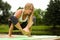 A beautiful girl performs a handstand.