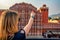 Beautiful girl points to Hawa Mahal. Wanderlust