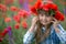 Beautiful girl in poppy wreath in the poppy field. series