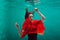 Beautiful girl in a red dress swims under water, amazing Underwater.