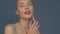 Beautiful girl with red lips and classic makeup posing in the studio. Beauty face.