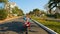 Beautiful Girl Rides Motorbike on Deserted Street