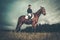 Beautiful girl sitting on a horse