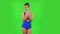 Beautiful girl in a swimsuit is clapping her hands indifferent. Green screen