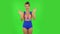 Beautiful girl in a swimsuit is waving hand. Green screen