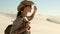 beautiful girl traveler in a safari hat and sunglasses in the desert