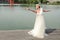 Beautiful girl in white gown of the bride dance