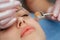 Beautiful girl woman in spa salon,facial rejuvenation procedure.Visit a beautician.Hyaluronic acid rejuvenation beauty injections