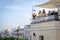 Beautiful girls having fun at rooftop bar near the Guadalquivir river, Seville, Spain.