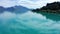 Beautiful glacial Lake Wakatipu and Southern Alps on a sunny day.