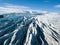 Beautiful glaciers flow through the mountains in Iceland. Aerial view and top view. Flowing Glacier in Greenland.