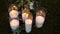 Beautiful glass vases with burning candles.Boho rustic decor. decorations for festive wedding ceremony