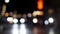 Beautiful glittering blurred bokeh of car, traffic and street light at city night, defocused colorful lights on street concept