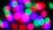 Beautiful glittering bokeh dark blurry background at night, round colorful shine and go out from multicolored lights. Abstract