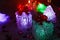 Beautiful glowing Christmas toys close on dark background