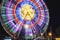 Beautiful glowing Ferris wheel against dark sky